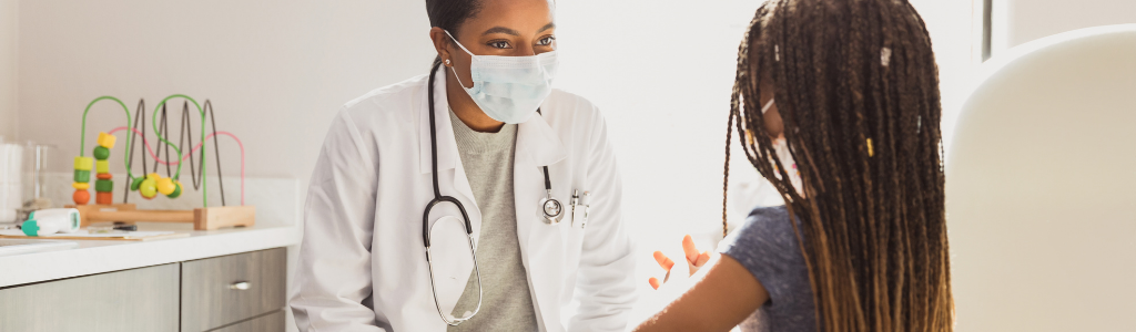 pediatrician with child