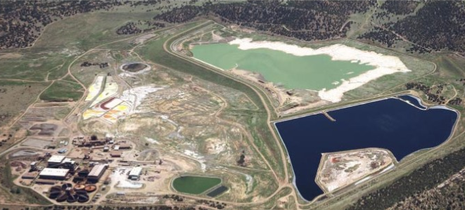 May 1988-  Cotter milling operations next to the primary and secondary impoundment. Remnants from the Old Ponds Area can be seen.